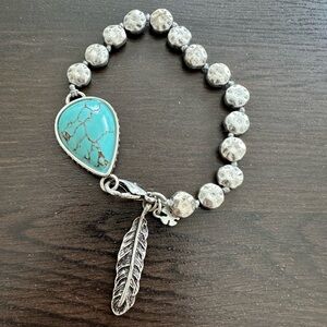 Lucky Brand Turquoise and Silver hammered Bracelet with Feather Charm